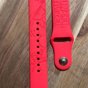 Anime Hunter Boy themed engraved design on a silicone watch band compatible with Apple Watch and Samsung Galaxy Watch.
