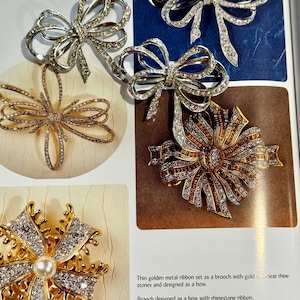 Set of three items: brooch KJL for Avon and earrings KJL