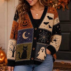May include: A V-neck button-down cardigan featuring a patchwork design with various Halloween-themed motifs including a jack-o'-lantern, crescent moon, stars, bats, a spider web, a black cat, and a ghost, all rendered in a multi-colored knit pattern.