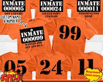 May include: A collection of orange t-shirts featuring black graphic prints. The shirts display text including INMATE, numbers like 000005, 000024, 000011, 000099, and phrases such as GOT CAUGHT, LOCKED DOWN 2ND BASE, THROWING TOO HARD, and WANTED FOR HIT AND RUN.