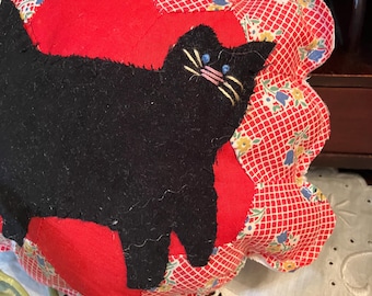 Small 'Dresden Plate' Pillow with Appliqued Black 'Cat on the Run' on top.