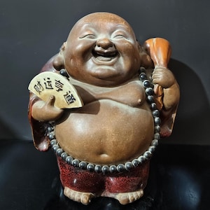 antique Shiwan Smiling Maitreya Buddha Statue – Laughing Budai with Fan & Sack, Chinese Ceramic Figurine for Wealth and Happiness