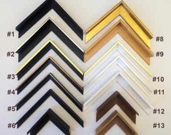 May include: A collection of fourteen picture frame corner samples, each displaying a different style and finish. The samples include black, gold, silver, white, and wood tones. Each corner is labeled with a number from #1 to #14.