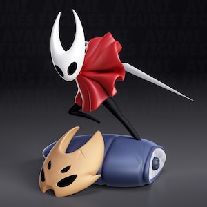May include: A white and red figurine of the Knight from the video game Hollow Knight. The Knight is standing on a blue and white cocoon with a golden mask lying next to it.