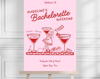Könnte beinhalten: Ein rosafarbenes Schild für einen Junggesellinnenabschied mit rotem Text und Illustrationen. Der Text lautet "Willkommen zu Madeline's Bachelorette Weekend 14.03.25 - 16.03.25" und "Freitag, der 14. März Byron Bay, Nsw". Das Schild zeigt auch eine Braut, die ein Martini-Glas mit dem Wort "Bride" darauf hält.