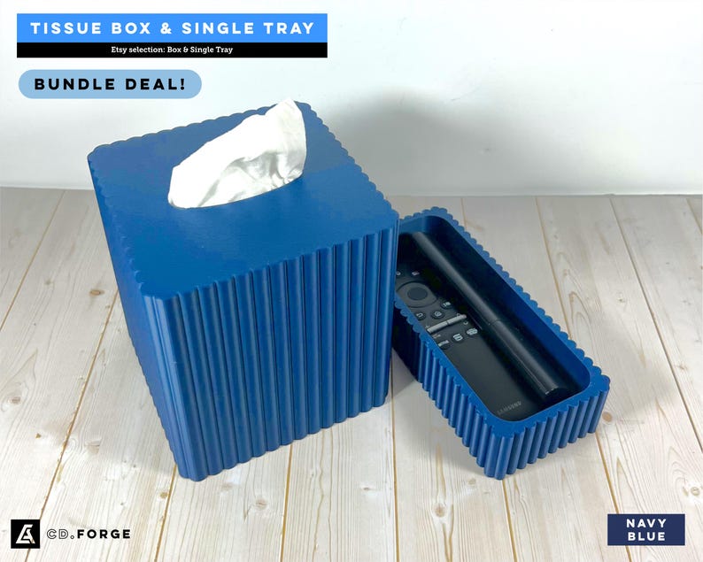 May include: A navy blue square tissue box cover and a matching rectangular tray with a ribbed texture. The tissue box holds white tissues, and the tray contains a black remote control. Text includes TISSUE BOX & SINGLE TRAY, BUNDLE DEAL!, and CD.FORGE.