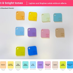May include: A collection of ten square acrylic swatches with rounded corners and a small hole in the top left corner. Each swatch features an embossed logo and comes in colors labeled as Peach, Sunny Yellow, Tea Green, Teal Green, Ice Blue, Lilac, Sakura Pink, Sand, Lime Green, and Electric Blue.