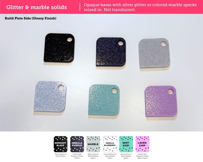 May include: Six square-shaped material swatches with rounded corners and a single circular hole. The colors include black, dark purple, gray, light blue, teal, and lavender, featuring either silver glitter or colored marble specks.
