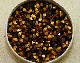 12pc 7x5mm Smoked Topaz Swarovski Oval Rhinestones - Article 4100 Machine cut 1st Quality genuine Swarovski - Deep Brown Earth Tone Amber