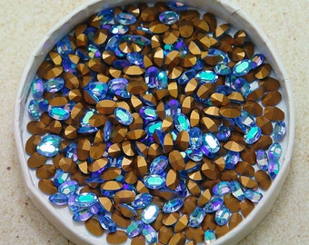 12 Stück 6 x 4 mm Light Sapphire AB Swarovski Oval Strasssteine - Artikel 4100 Maschinengeschnittene 1st Qualität echte Swarovski in pastellblau kornblume