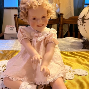 Holloween Shirley Temple Porcelain doll orange eyes