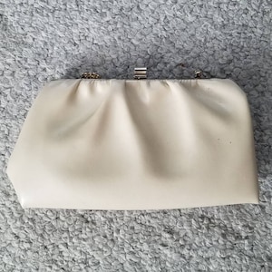 Beige pleated creamy clutch bag