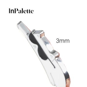 May include: A silver and white cat-shaped pin with black detailing. The pin is 3mm thick and features the text "InPalette". The pin has a shiny finish and a simple design.