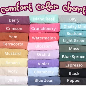 a pile of comforter sheets with different colors