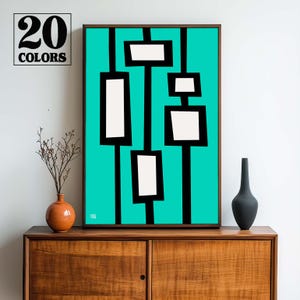 May include: Abstract geometric art print with black lines and white shapes on a turquoise background. The print is framed in a black frame.