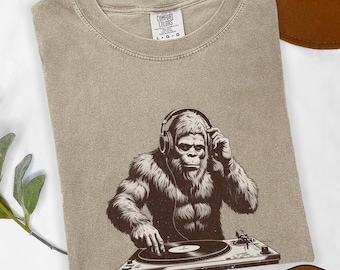 Retro Sasquatch DJ T-Shirt, Bigfoot Comfort Colors Tee, Funny Cryptid Music Gift, Distressed DJ Graphic Shirt for Men & Women Music Lovers
