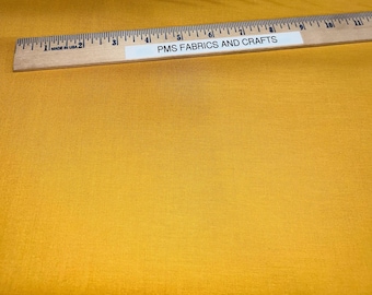 Called Dijon MODA Bella Solid 100% Cotton Fabric sold by the yard 36 x 44 inches - Dijon Mustard color 9900 456