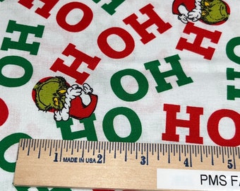 RK Grinch Stole Christmas Grinch Ho Ho Ho 100% cotton fabric by the yard 36 x 44 on white - item ADE-20997-223 - Grinch face with Santa Hat