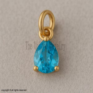 14K Gold Pear Blue Topaz Pendant - December Birthstone Charm