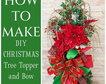 May include: How to Make DIY Christmas Tree Topper and Bow. A red poinsettia with green and gold ribbon and greenery is shown on top of a Christmas tree.