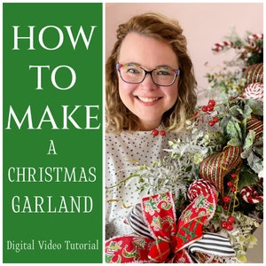 May include: A woman smiles while holding a Christmas garland decorated with red and green candy canes, red berries, and a large red and white bow. The text "HOW TO MAKE A CHRISTMAS GARLAND" is displayed on a green background with the words "Digital Video Tutorial" below.