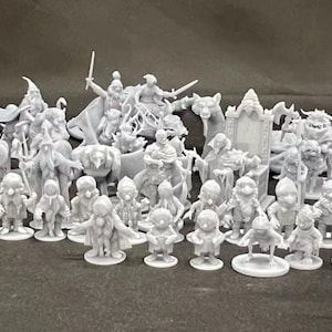 May include: A collection of 3D printed figurines, mostly gray in color, depicting various characters and creatures. The figurines are arranged in a group on a white surface.