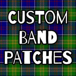 May include: Image features the text "CUSTOM BAND PATCHES" in bold white letters with a black outline, set against a colorful plaid background of blue, green, and red. The design suggests custom band patches.