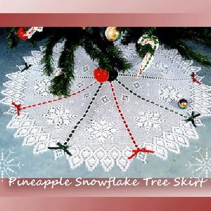 May include: White crocheted pineapple snowflake tree skirt with red and green accents.  "Pineapple Snowflake Tree Skirt" is written in the bottom center of the image.