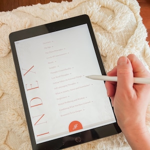 May include: A digital tablet displaying an index of topics related to mental health and well-being. The index includes topics such as the ego, the three principles, levels of consciousness, moods, insights, thought-created reality, low mood thoughts, setting values on external things, self-sabotaging thoughts, what is anxiety, stress and overwhelm, forgiveness, mental well-being and wisdom, combining what you have learned, and resources to go deeper.