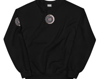 May include: Black long-sleeve sweatshirt with a circular logo featuring the number "13" in red and white on the chest. The logo has a gear design around it.