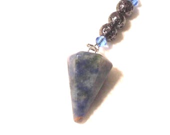 Magical pendulum, blue stone focal, acrylic and stone beads. 11.5 inches long. 120