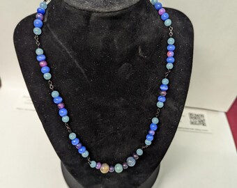 Blue and purple beaded necklace. 117