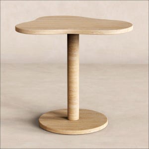 May include: A side table crafted from light beige travertine stone, featuring an organic, asymmetrical, kidney-shaped tabletop supported by a single cylindrical pedestal column that rests on a circular base of the same matching natural stone material.