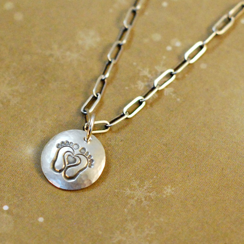 1/2 sterling silver hammered hand stamped oxidized disk charm with baby footprints with a heart, mom, grandmother image 2