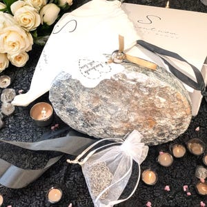 Woman Clutch Bag—Designer Bag, Handmade Bag, Statement-Fashion, Fancy Bags for Women, Women's Small Bag Clutch, Gift Her!. Bridal Clutch Bag—Mother of Peral style bag This oval-shaped hard shell clutch is not just a bag; it's a conversation starter meticulously designed to echo the breathtaking textures of the moon's landscape. Its pristine white exterior glimmers softly, capturing the light and reflecting it in a way that draws attention without saying a word. Handmade in USA. Mothers day gift