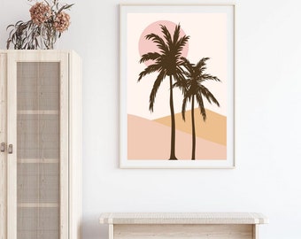 May include: A minimalist art print featuring two palm trees silhouetted against a pink and orange sunset. The print is framed in a light wood frame.