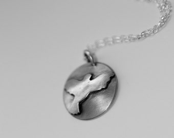 Sterling silver Dove in flight necklace handmade by Norita Designs