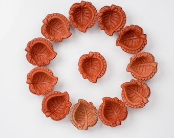 Handcrafted Leaf-Shaped Clay Diyas Set with Cotton Wicks – 12 Pack Traditional Oil Lamps for Diwali, Festivals & Home Decor