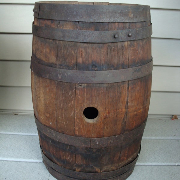 Price reduced....Old brown wood and metal wine/whiskey barrel