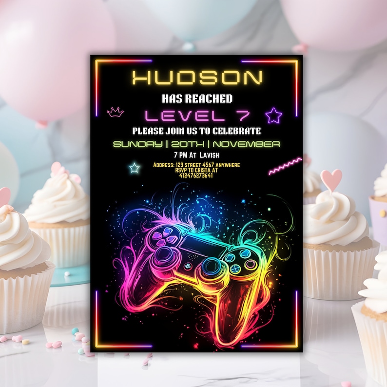 May include: A black and neon-colored invitation for a birthday party. The invitation features a neon-colored video game controller with the text "HUDSON HAS REACHED LEVEL 7" and "PLEASE JOIN US TO CELEBRATE SUNDAY | 20TH | NOVEMBER 7 PM AT LAVISH ADDRESS: 123 STREET 4567 ANYWHERE RSVP TO CRISTA AT 412476273641".