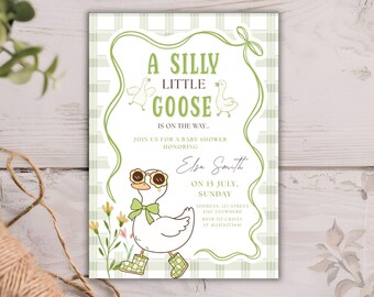 May include: A baby shower invitation with a playful design. The invitation features a cartoon goose wearing sunglasses and boots, with the text "A Silly Little Goose is on the way." The invitation is 12.7 x 17.8 cm.