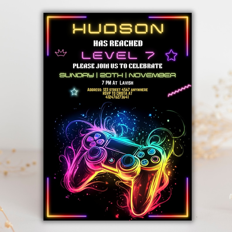 May include: A neon-colored video game controller graphic on a black background with the text "HUDSON HAS REACHED LEVEL 7 PLEASE JOIN US TO CELEBRATE SUNDAY | 20TH | NOVEMBER 7 PM AT LAVISH ADDRESS: 123 STREET 4567 ANYWHERE RSVP TO CRISTA AT 412476273641".