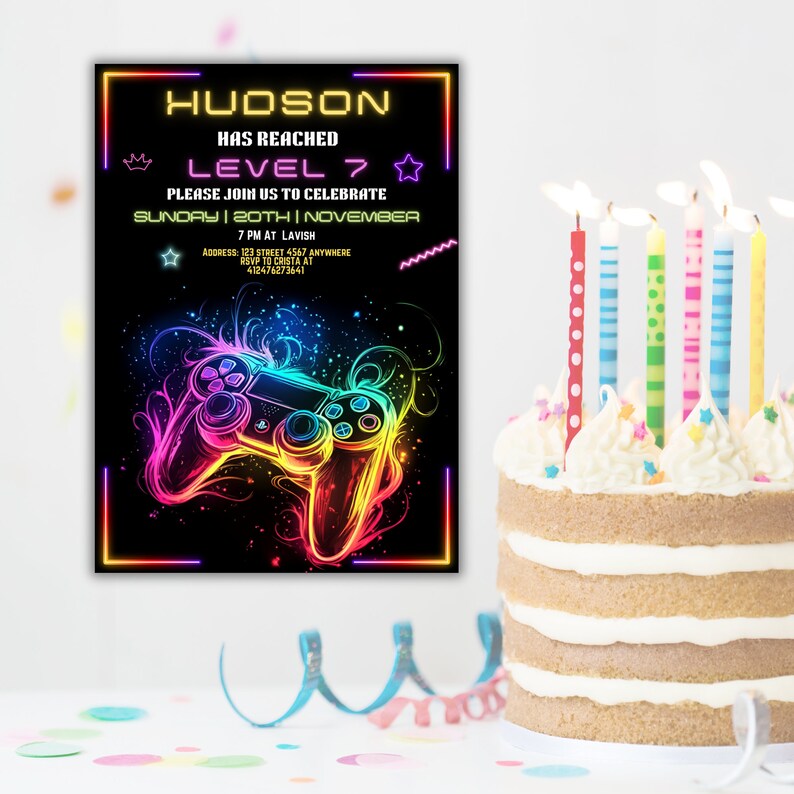 May include: A neon-colored invitation for a video game themed birthday party. The invitation features a neon-colored video game controller with the text "HUDSON HAS REACHED LEVEL 7 PLEASE JOIN US TO CELEBRATE SUNDAY | 20TH | NOVEMBER 7 PM AT LAVISH ADDRESS: 123 STREET 4567 ANYWHERE RSVP TO CRISTA AT 412476273641".