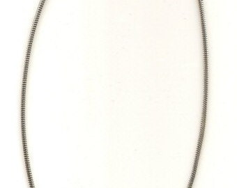 May include: A silver snake chain necklace with a lobster clasp closure.