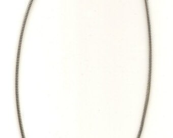 May include: A silver snake chain necklace with a clasp closure.