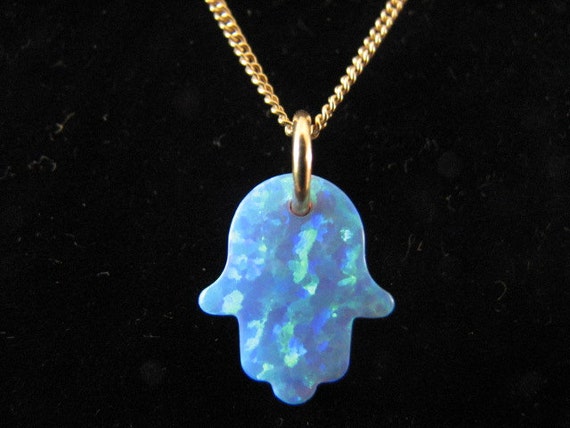 Blue hand necklace deals
