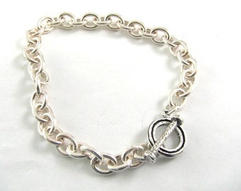 Traditional Sterling Silver Oval Link Charm Bracelet with Toggle Clasp