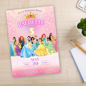 May include: Pink princess party invitation with a crown and the text "It's a Princess Party" and "Rachelle is turning 5". The invitation features a group of Disney princesses in their iconic dresses.