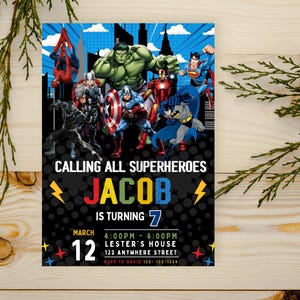 May include: A superhero-themed birthday party invitation for a boy named Jacob turning 7. The invitation features a black background with colorful text and images of superheroes like Spiderman, Hulk, Iron Man, and Batman.