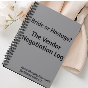 May include: A gray spiral bound notebook with the text "Bride or Hostage? The Vendor Negotiation Log" and the caption "You're charging how much for folding chairs?!"